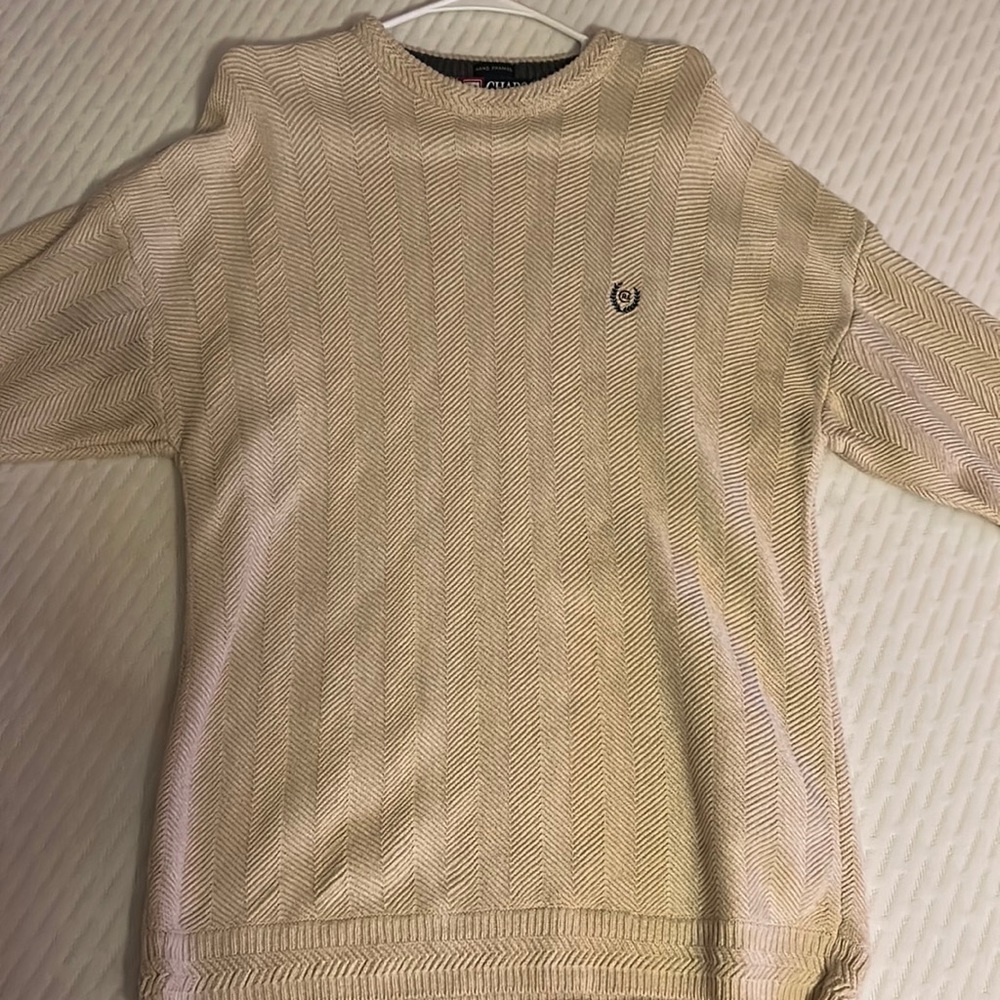 Size medium cream sweater. Ralph Lauren, been worn twice and no stains.